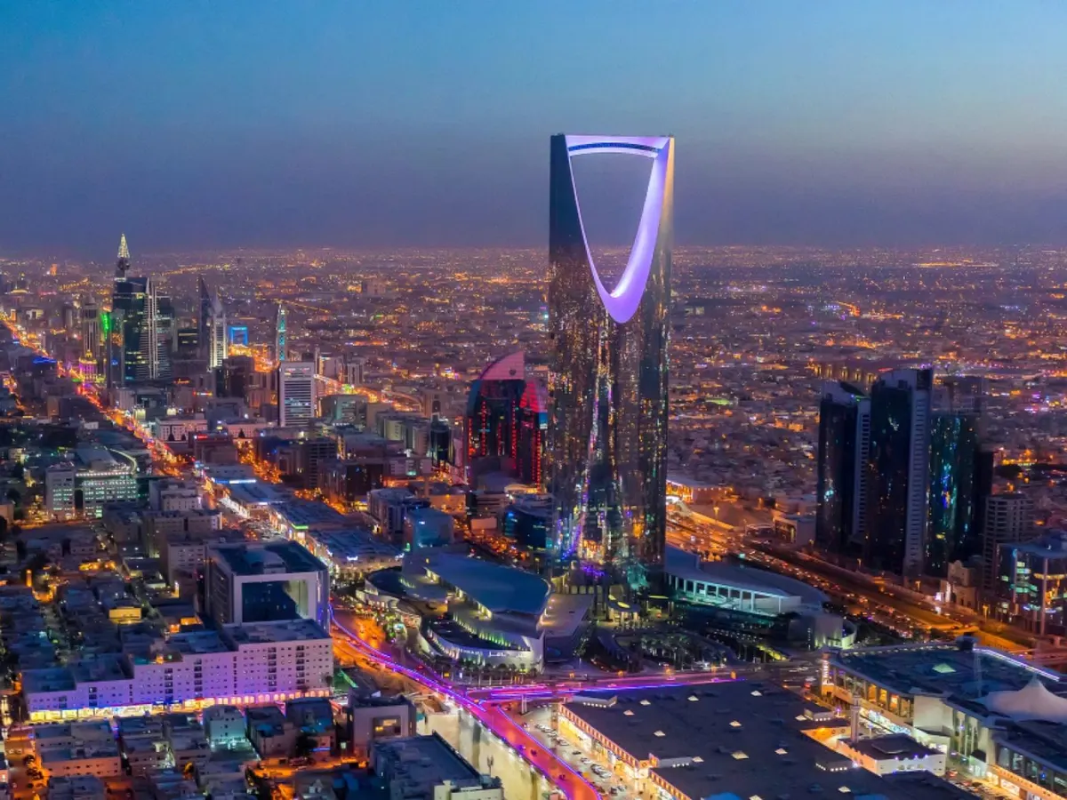 Riyadh skyline at dusk with the Kingdom Centre tower lit up